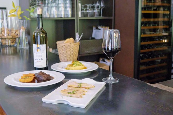 Sevilla Food Tour: Tapas, Wine, History & Traditions - Santa María la Blanca bar: slow-cooked carrillada and chickpea spinach