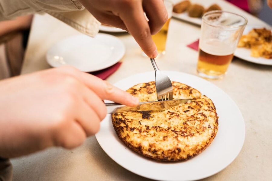Seville Food Tour with Tapas & Drinks with a Local - Jamón and cheese: the fast lesson in Spanish flavors