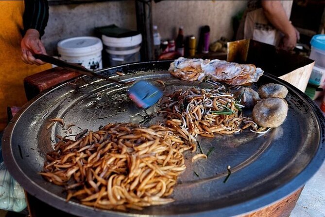 Siem Reap Food Tour By Local - Stop 3: Wat Bo’s fried cake with spring onions and sweet peanut dip