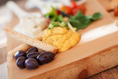 Small-Group Greek Food and Wine Tasting Tour in Santorini - Two family wineries with a volcanic-soil lesson you can taste