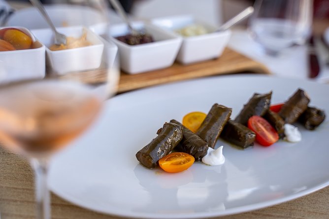 Small-Group Greek Food and Wine Tasting Tour in Santorini - A 3-course meze dinner with local wine at a traditional restaurant