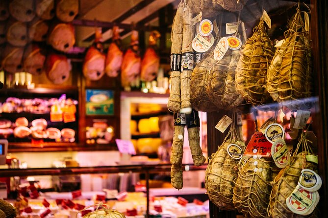 Taste Parma: A Full Meal Walking Food Tour by Do Eat Better - Stop 1 on Via Farini: aperitivo with Prosciutto di Parma and Parmigiano Reggiano