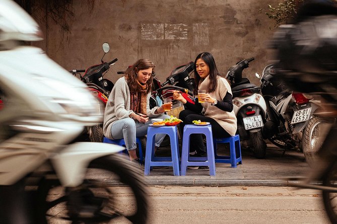 The 10 Tastings of Hanoi With Locals: Private Street Food Tour - Stop 1 and 2: water puppet theater area, then Ba Da Temple