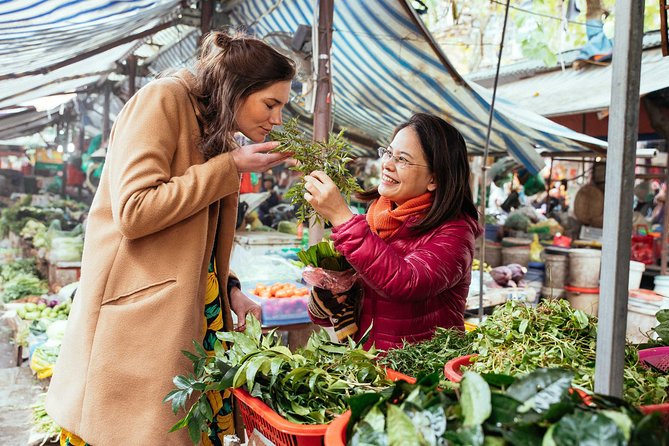 The 10 Tastings of Hanoi With Locals: Private Street Food Tour - Stop 5 and 6: bún chả and steamed rice rolls, where Hanoi turns up the flavor