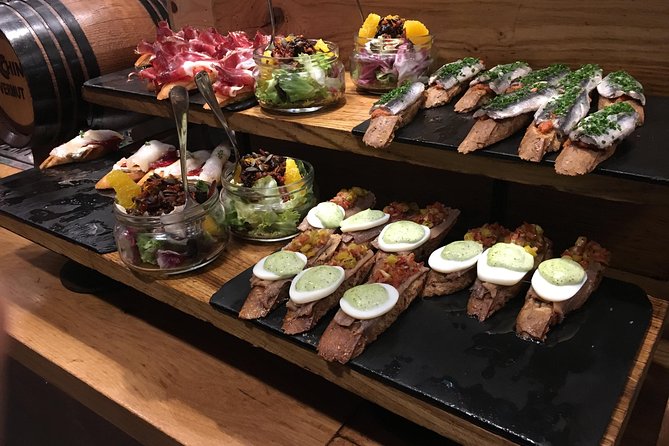 The Award-Winning Bilbao Food Tour & Wine Pairing by Basque Local - Award-winning bites plus old-school Bilbao: mixing modern bars with history