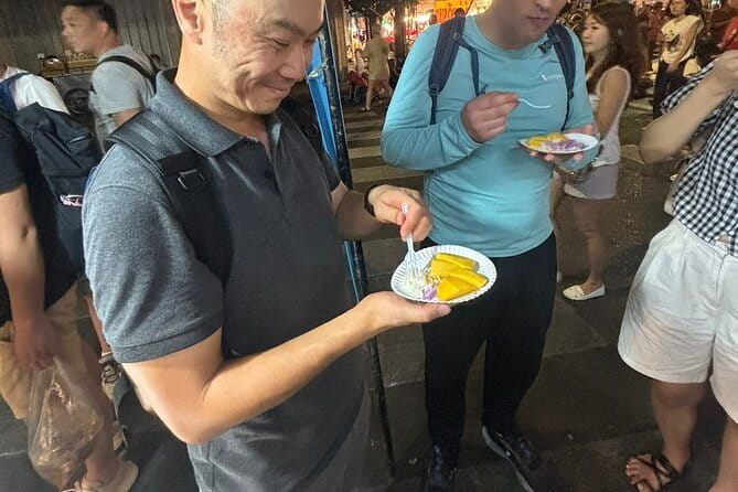 The Highest Rated Food Tour in Bangkok 10+ Tastings - Stop One on Chinatown Road: Pork-Leg Heritage, Michelin Snacks, and Big Flavor
