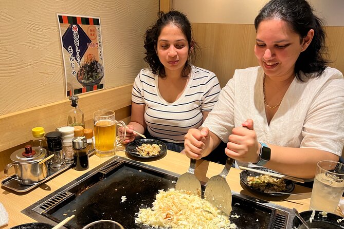 Tokyo: Best Ginza Food Tour at 3 Local Eateries - Stop 2 in Yurakucho: Cozy Izakayas and Comfort Food Energy