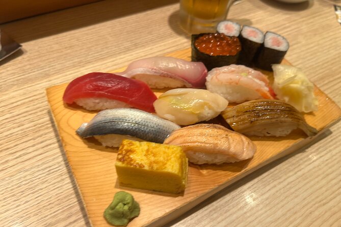 Tokyo: Best Ginza Food Tour at 3 Local Eateries - Stop 3 in Shimbashi: Office-Worker Nightlife With Real Momentum