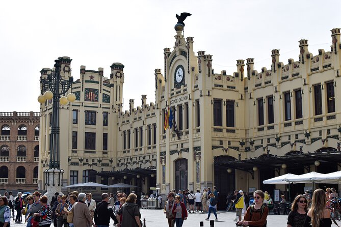 Valencia Centre Food Tour with 9+ Tastings of Regional Delicacies - Stop 5 on Plaça del Tossal: fresh fish tapas in the middle of the action