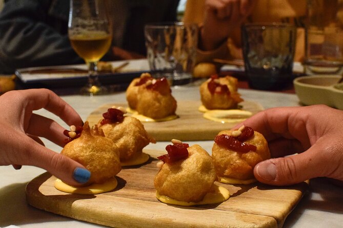 Valencia Centre Food Tour with 9+ Tastings of Regional Delicacies - The secret dish, wine, and why the drinks matter