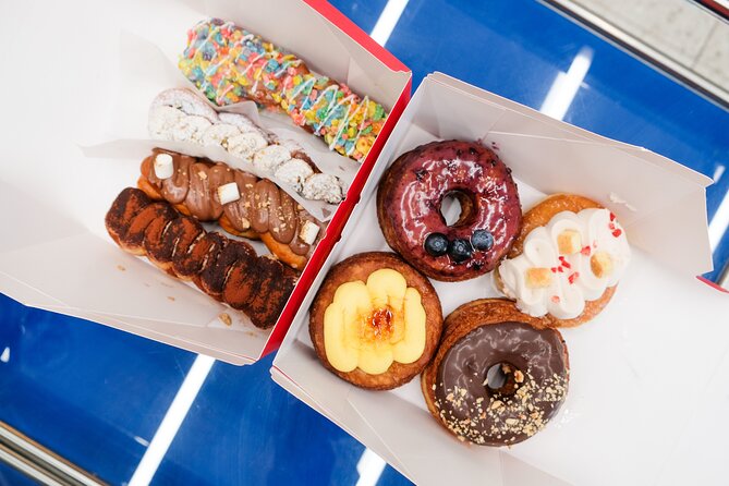 Vancouver’s Sweetest Stroll: A Delicious Donut Experience - Canada Place and the Olympic Cauldron: a scenic pause for photos