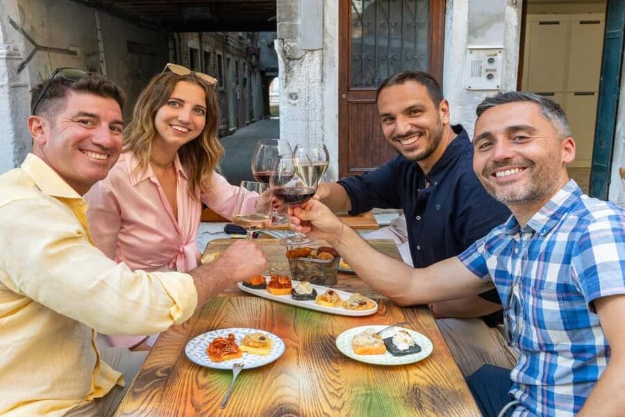 Venice Food Tasting Tour: Bites, Wine, Dinner & Local Guide - Stop 2: Fish cicchetti plus ombra wine