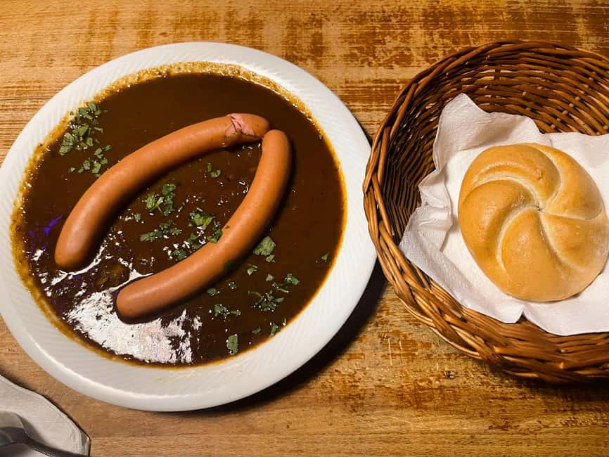 Vienna: Food tasting tour of Hidden Gems (Small Groups) - Wiener sausage with goulash sauce and Grüner Veltliner