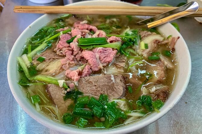 Walking Street Food Tour in Hanoi and Train Street - Stop 2 at Duờng Tàu: Train Street Photos, Egg Coffee, and the Wait for the Train