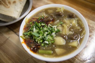 Xi'an Evening Food Tour by TukTuk - Muslim Quarter stop: where family specialties come from